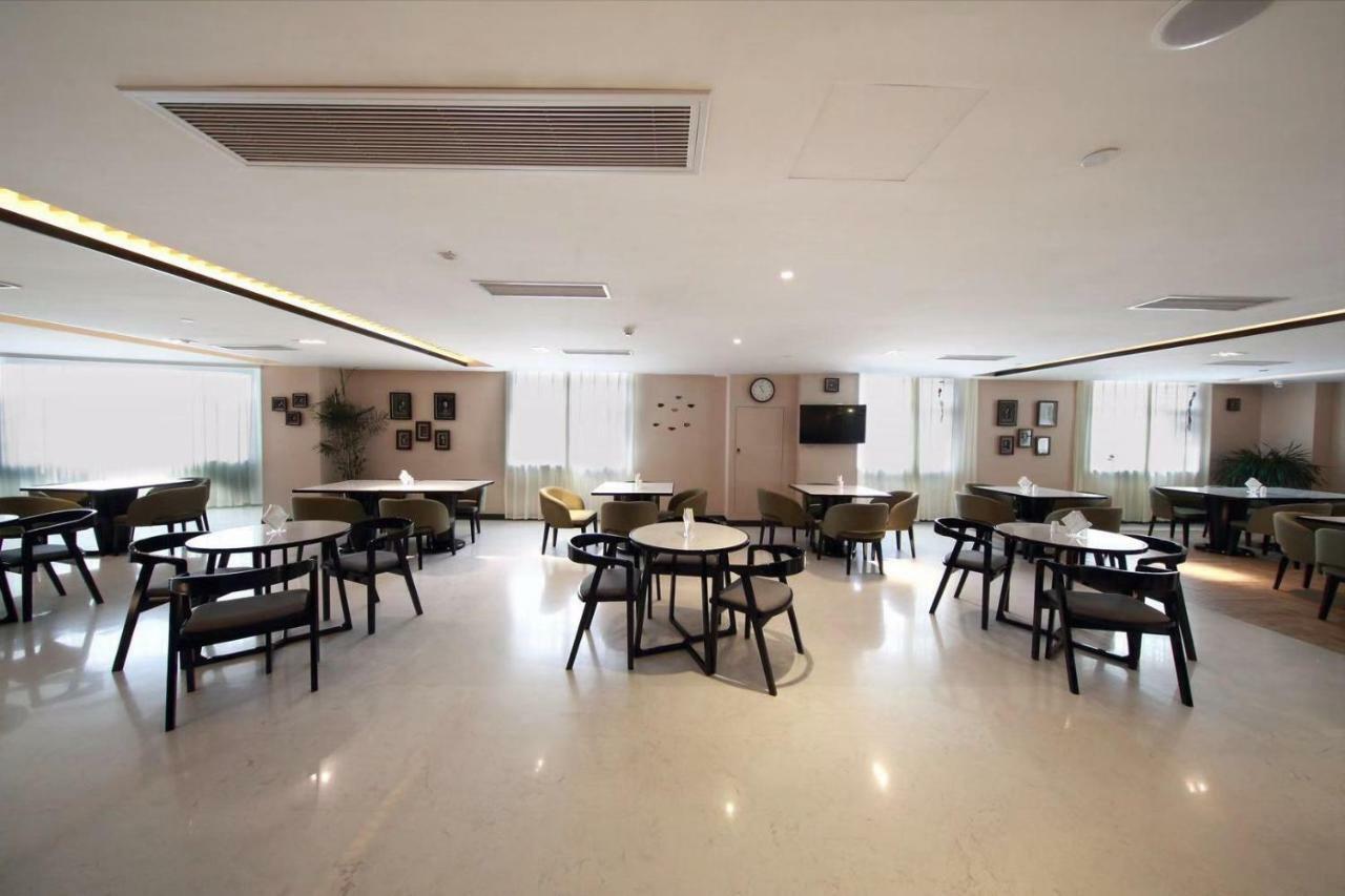 锦江都城酒店海南省政府日月广场免税店 Haikou  Esterno foto